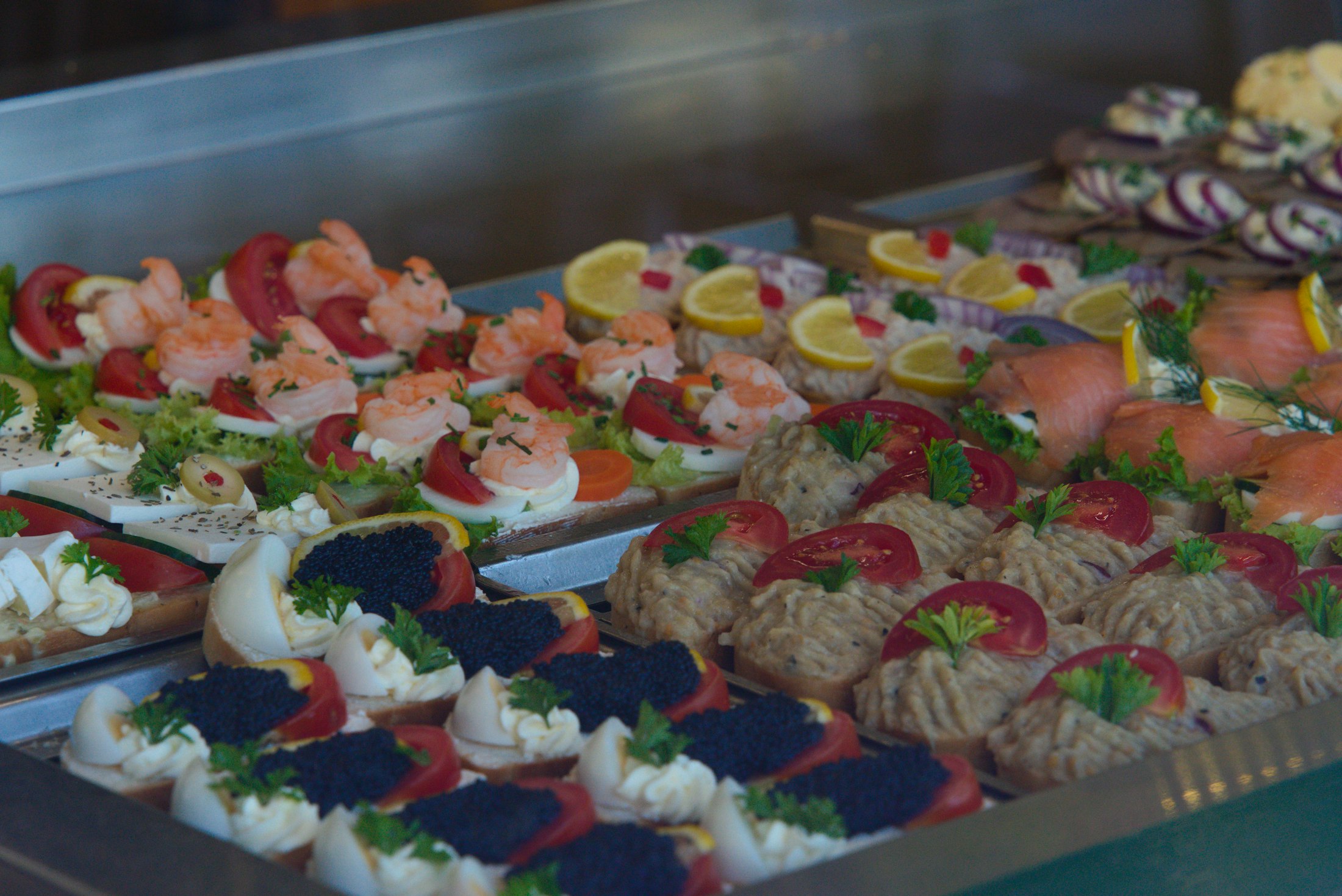 Representative assortment of canapés with salmon, shrimp and caviar